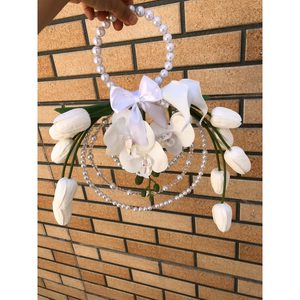 دسته گل عروس مدل کیفی — تصویر ۴